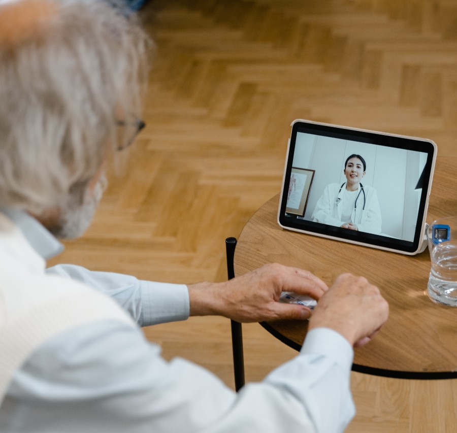 Doctor consulting with a patient on a video call